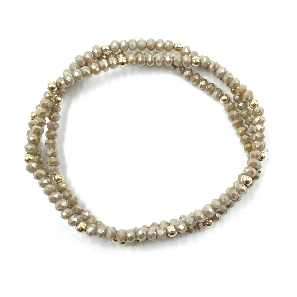 Our erin gray original (OG) classic shimmer 3-stack bracelets in champagne sparkle, dotted with 14k gold-filled 3mm beads.  A classic favorite that stacks well with others.  7 inch stretch bracelets.
