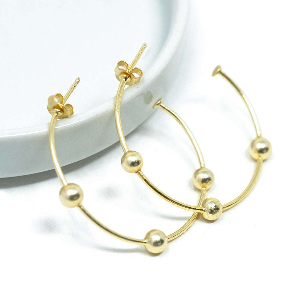 Light as air small gold post hoops with gold satellites.  1 1/2 inches.  24k gold over sterling small hoop earring.