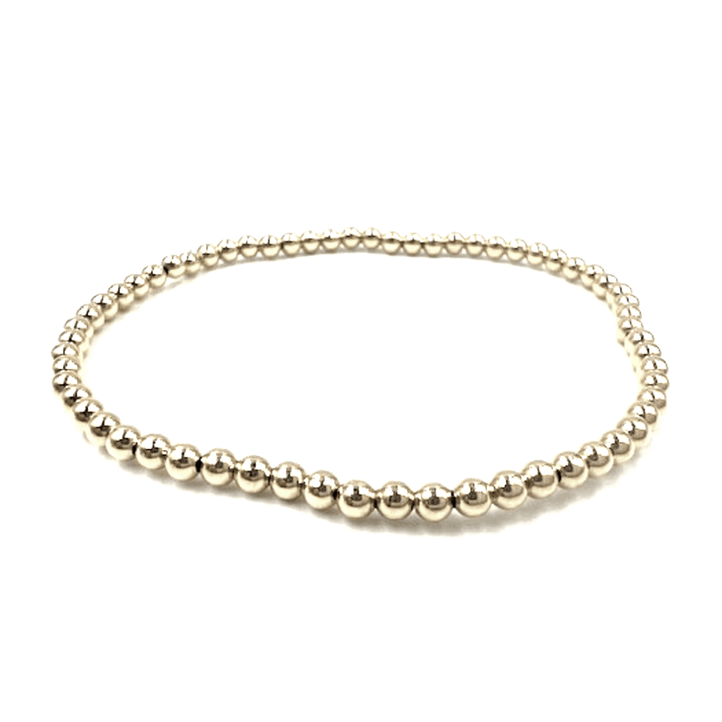 14k gold filled 3mm beaded stretch bracelet. wear single or stack it. part of our erin gray waterproof collection. 6.5"-7"-7.25"