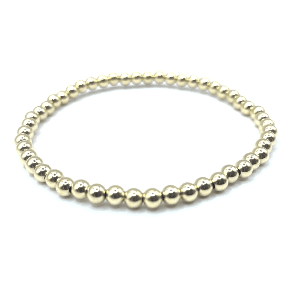 14k gold filled 4mm beaded stretch bracelet. wear single or stack it. part of our erin gray waterproof collection. 6.5" and 7" bracelet