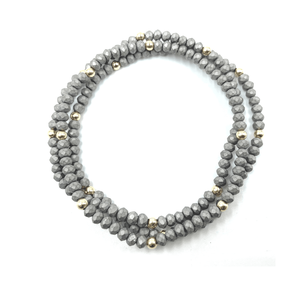 Our erin gray original (OG) classic 3-stack bracelets in a matte gray dotted with 14k gold-filled 3mm beads. A classic favorite that stacks well with others. 7 inch stretch bracelets.