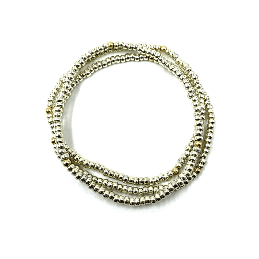 Our erin gray original (OG) classic 3-stack bracelets in platinum dotted with 14k gold-filled 3mm beads. A classic favorite that stacks well with others. 7 inch stretch bracelets.