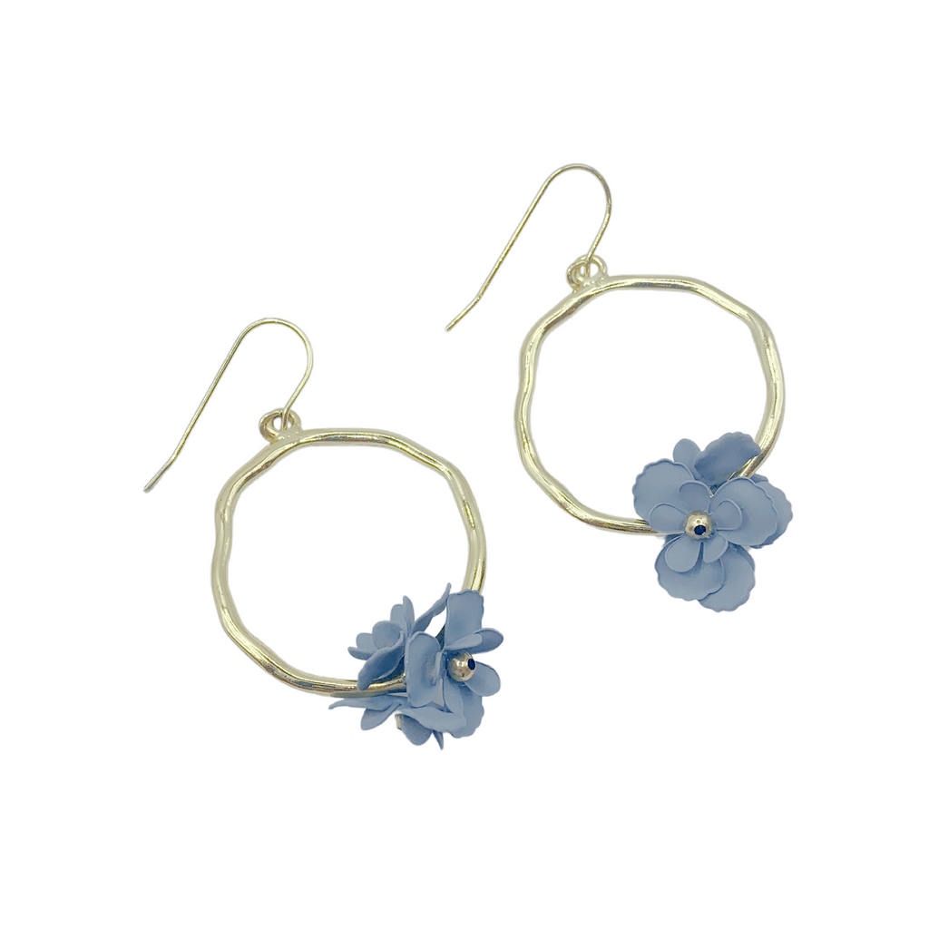 Style inspiration! Organic gold hoop earrings with unique flower accents.