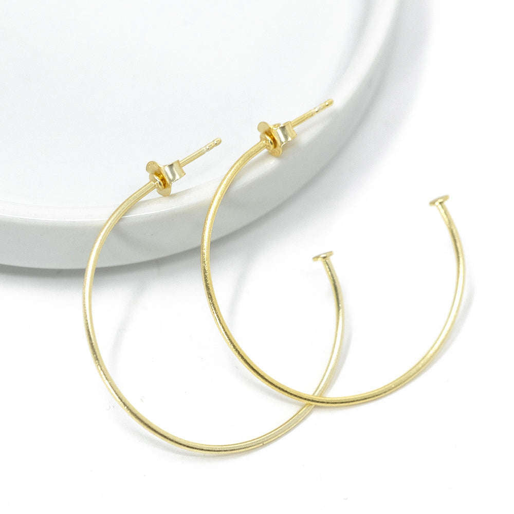 Light as air classic small gold hoops with post! 1 3/4 inches. 24k gold over sterling hoop earring.