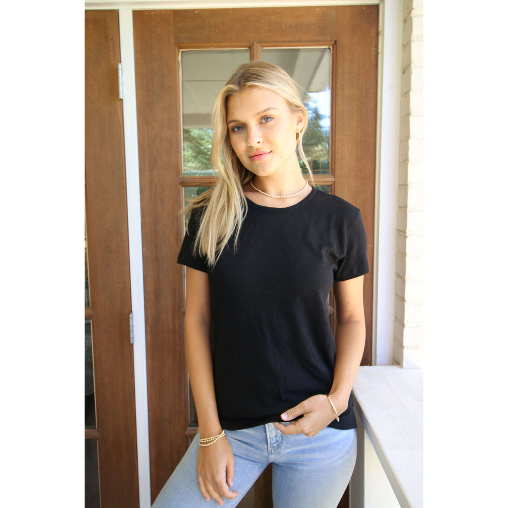 A Perfect Basic Jeans Crew! Made with 100% pima cotton slub material, this tee is both super comfy and stylish. With side vents and a slightly longer length in the back, it's the perfect everyday tee that flatters your figure without being too tight or boxy. Plus, with its tagless design, you won't have to worry about any annoying tags itching your skin.